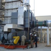 sigma thermal employees servicing a direct fired heater outside a facility